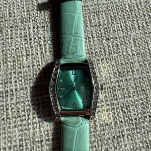 Chic Women's Green Watch with Silver Detailing